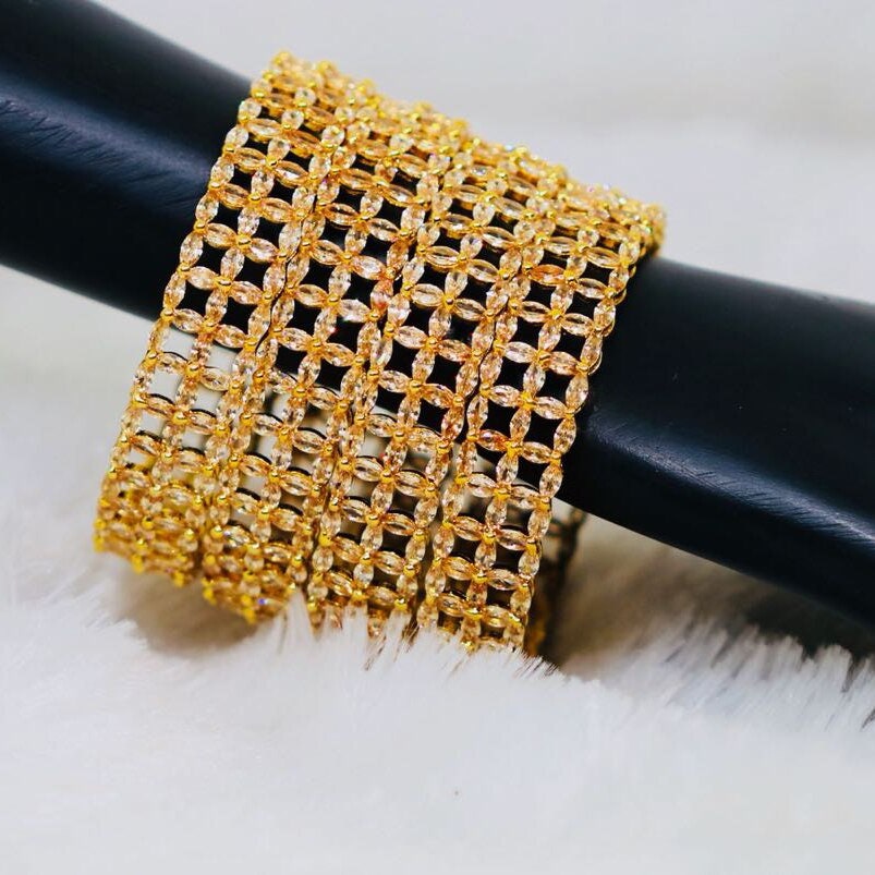 Indian style 22K gold zircon bangles studded with Clear ruby pink topaz cubic zirconia