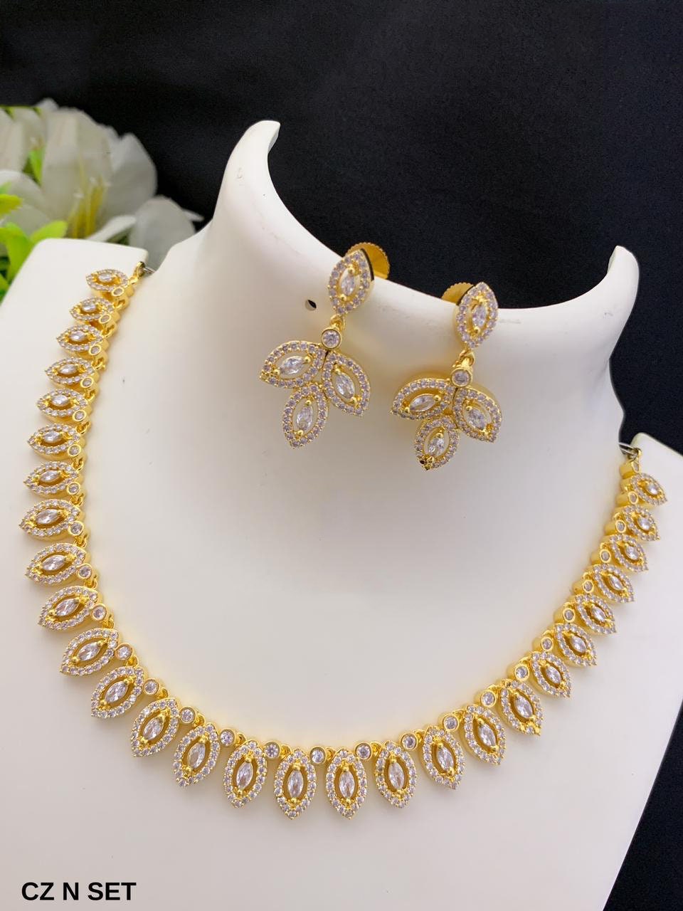 Gold-plated american diamond necklace set with earrings | marquise cut emerald necklace | Indian jewelry store online | South Indian style