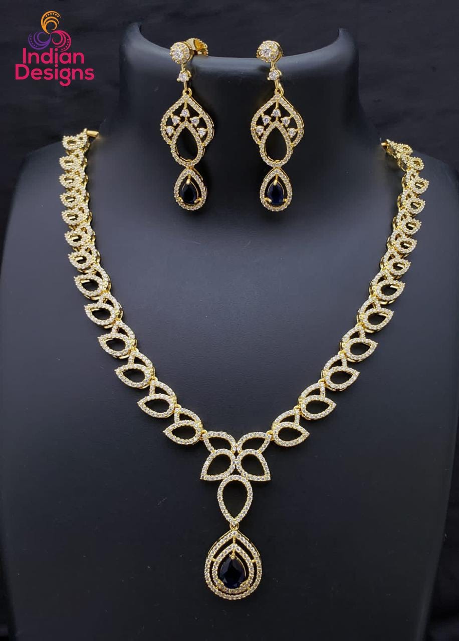 Beautiful CZ American Diamond necklace in gold polish with Tear-drop Color stone Pendant