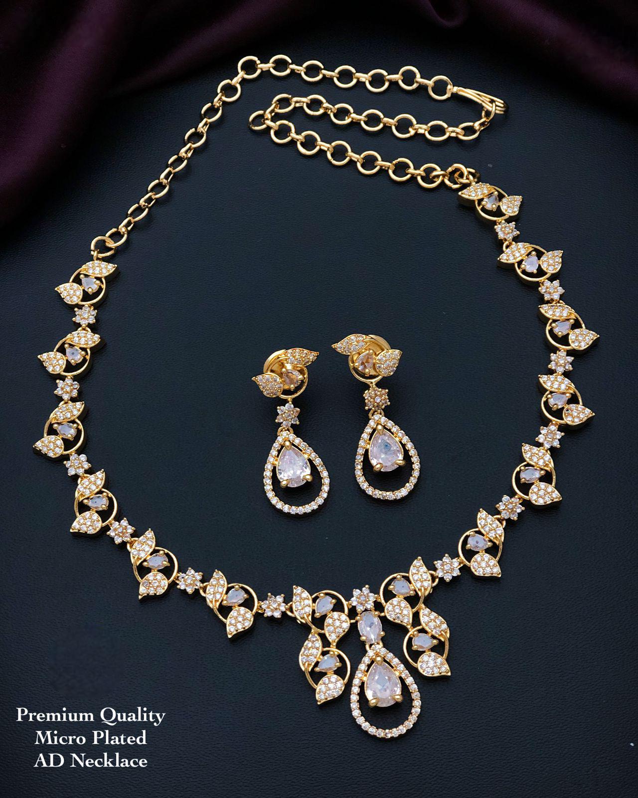 South Indian gold choker necklace designs| Small gold choker necklace designs with Pearl drops and AD stones| American Diamond Necklace