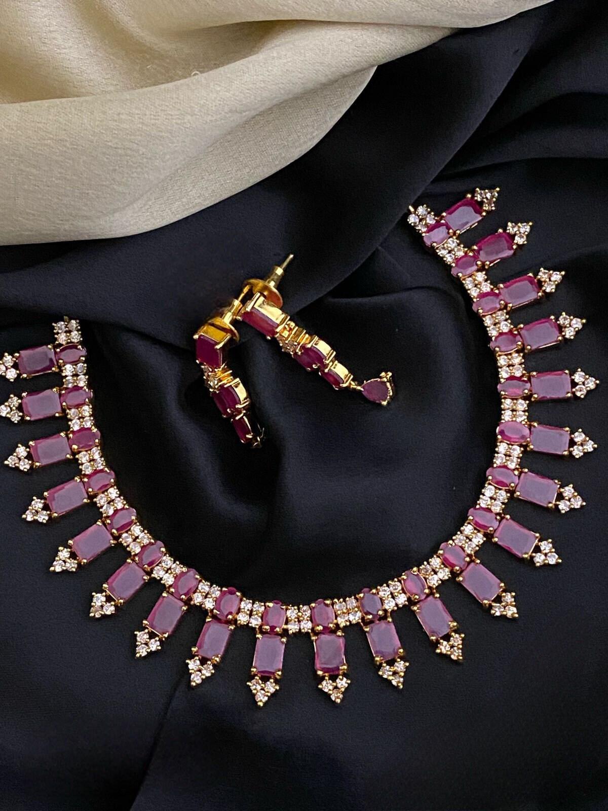 Gold plated Cz American Diamond ruby, Emerald and Blue Sapphire stones necklace earrings Indian Jewelry | AD stones Simple gold choker set
