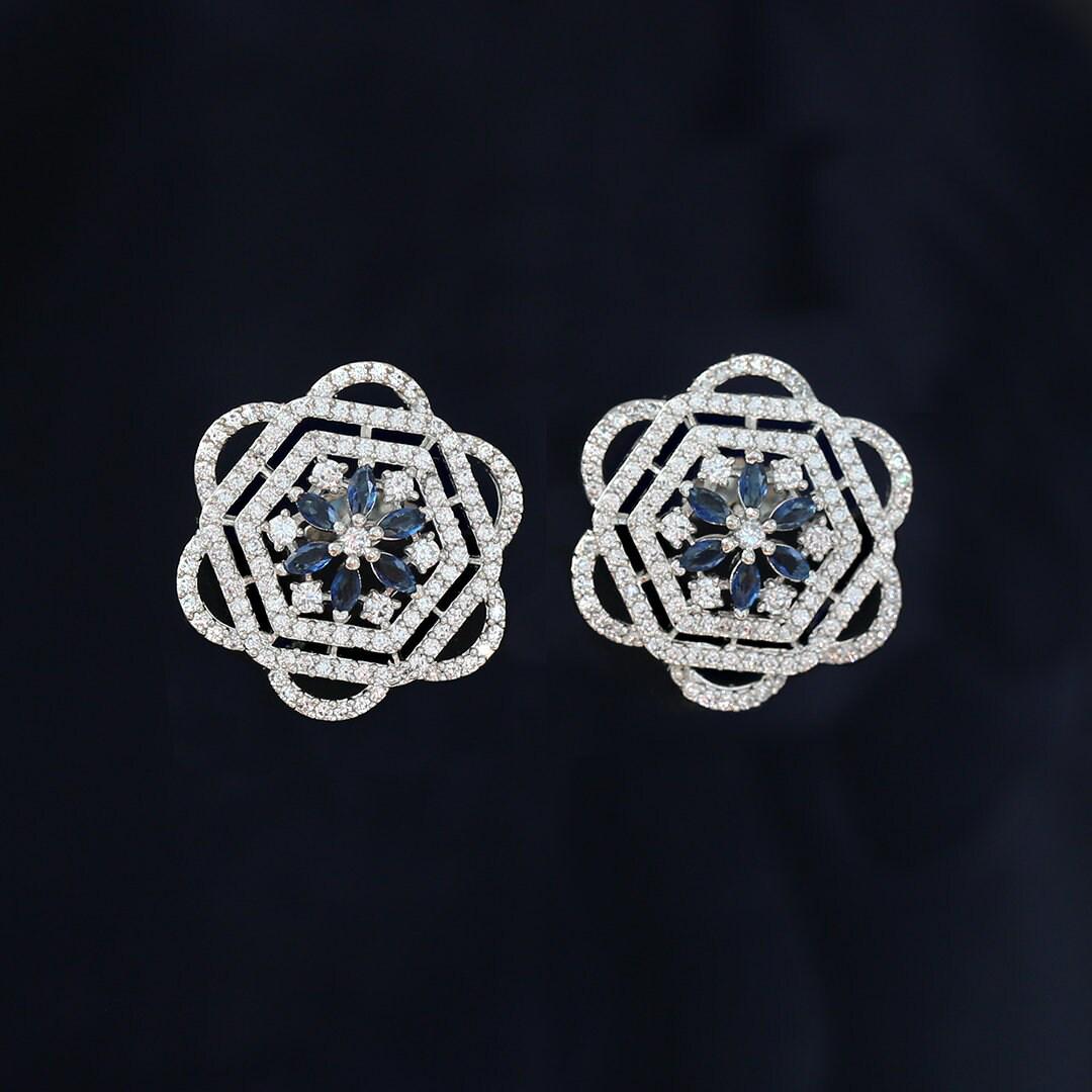 Trend setting rhodium plated stud earrings in floral pattern | bridal jewelry silver earrings | high end cubic zirconia studs online