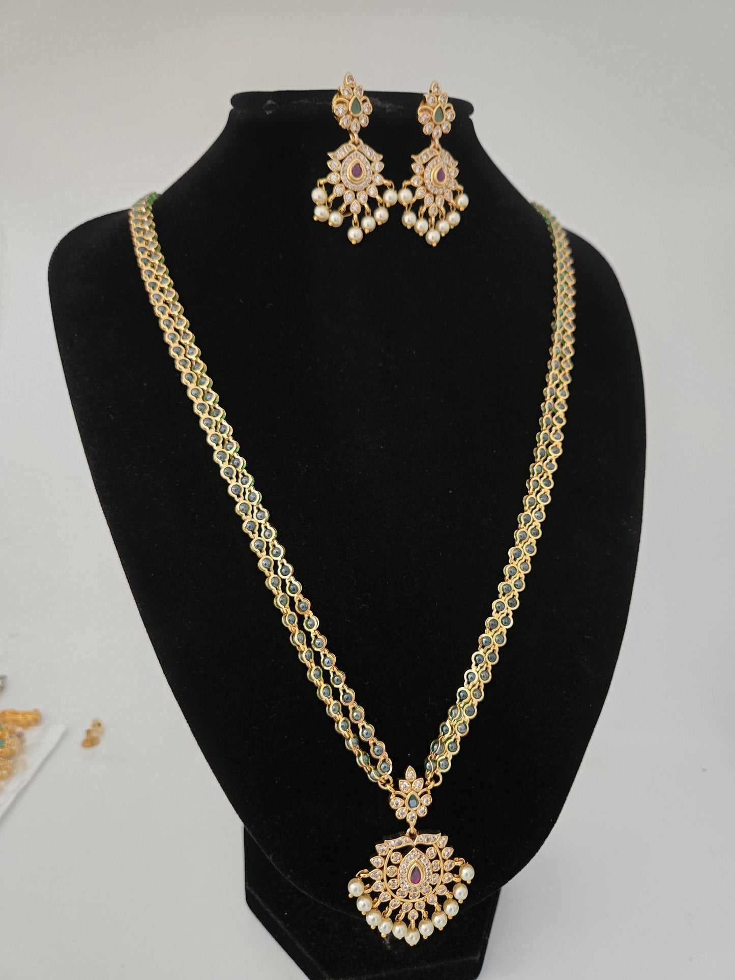 Matte gold plated haram necklace and earring set with floral design|traditional south indian jewelry|bollywood style cz american diamond set