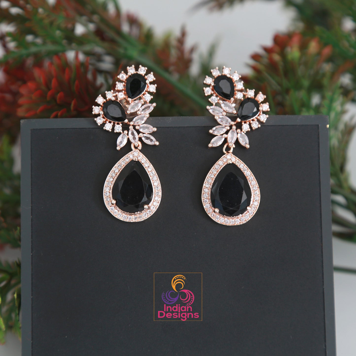 Rose Gold CZ American diamond Designer Earrings floral design with Large Pear-shaped color stones