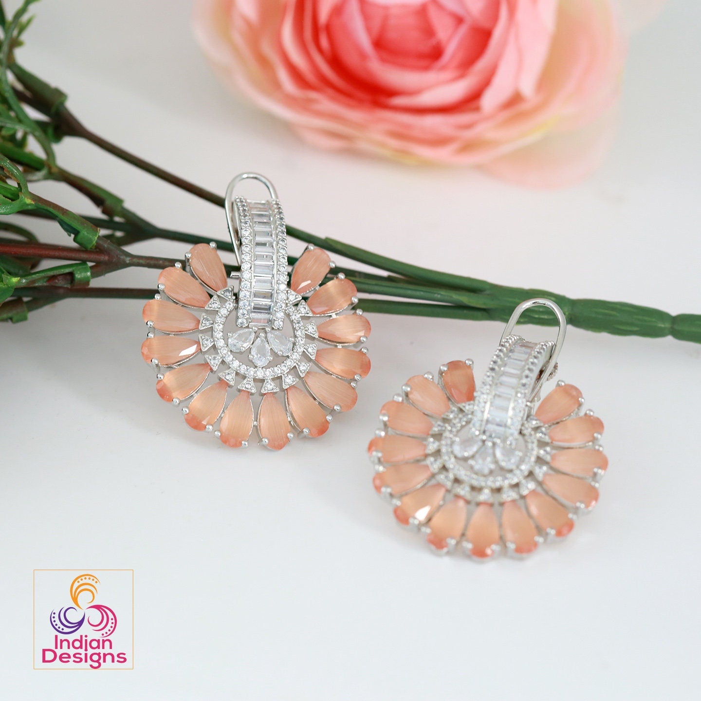 Big flower stud Crystal earrings | Ad stud earrings Peach stones | Rhodium Plated American Diamond stud Earrings | Bollywood style CZ Studs