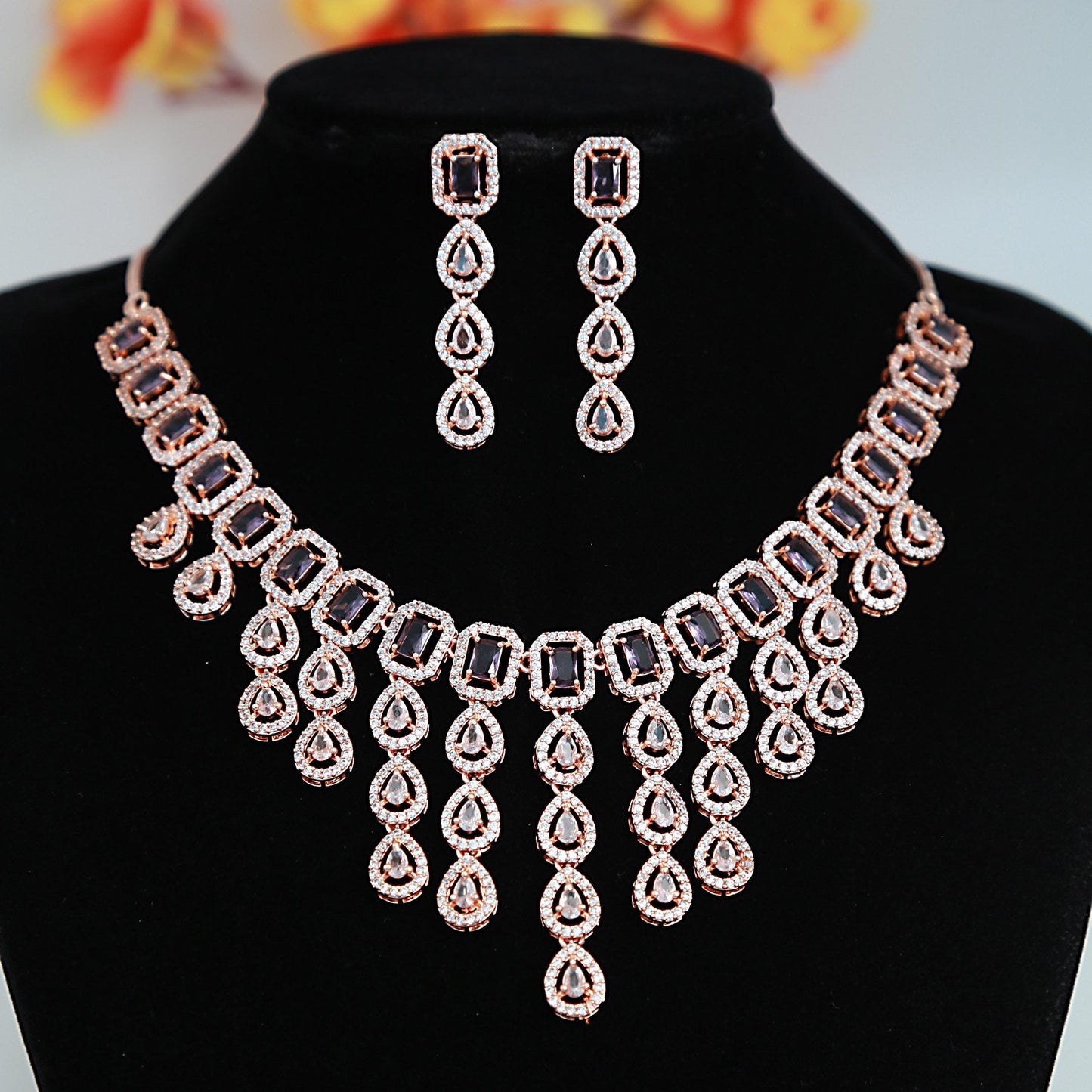 Rose Gold American Diamond multi strand Purple necklace and Earrings