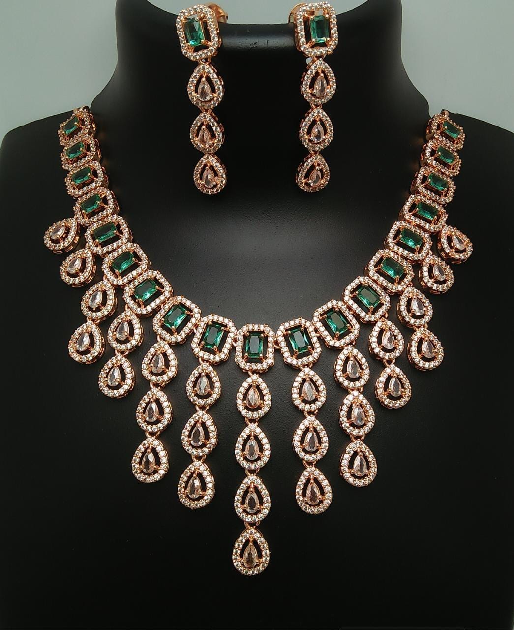 Rose Gold American Diamond multi strand Purple necklace and Earrings