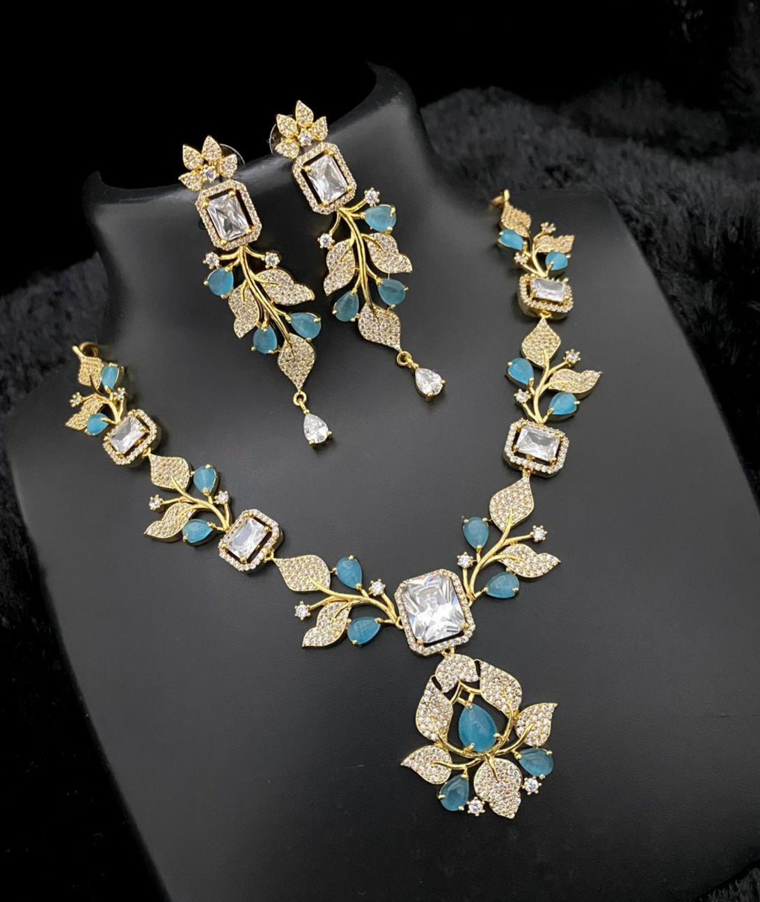 Unique Jewelry-Gold Plated American diamond flower & Leaf design necklace | Crystal  necklace with Pear cut CZ Blue stones | Gift for Her