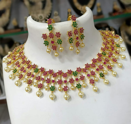 22K Gold Plated Floral Ruby Emerald American Diamond Necklace Indian Designs | CZ Color stone Crystal star necklace | Wedding Bridal Necklace Earring set