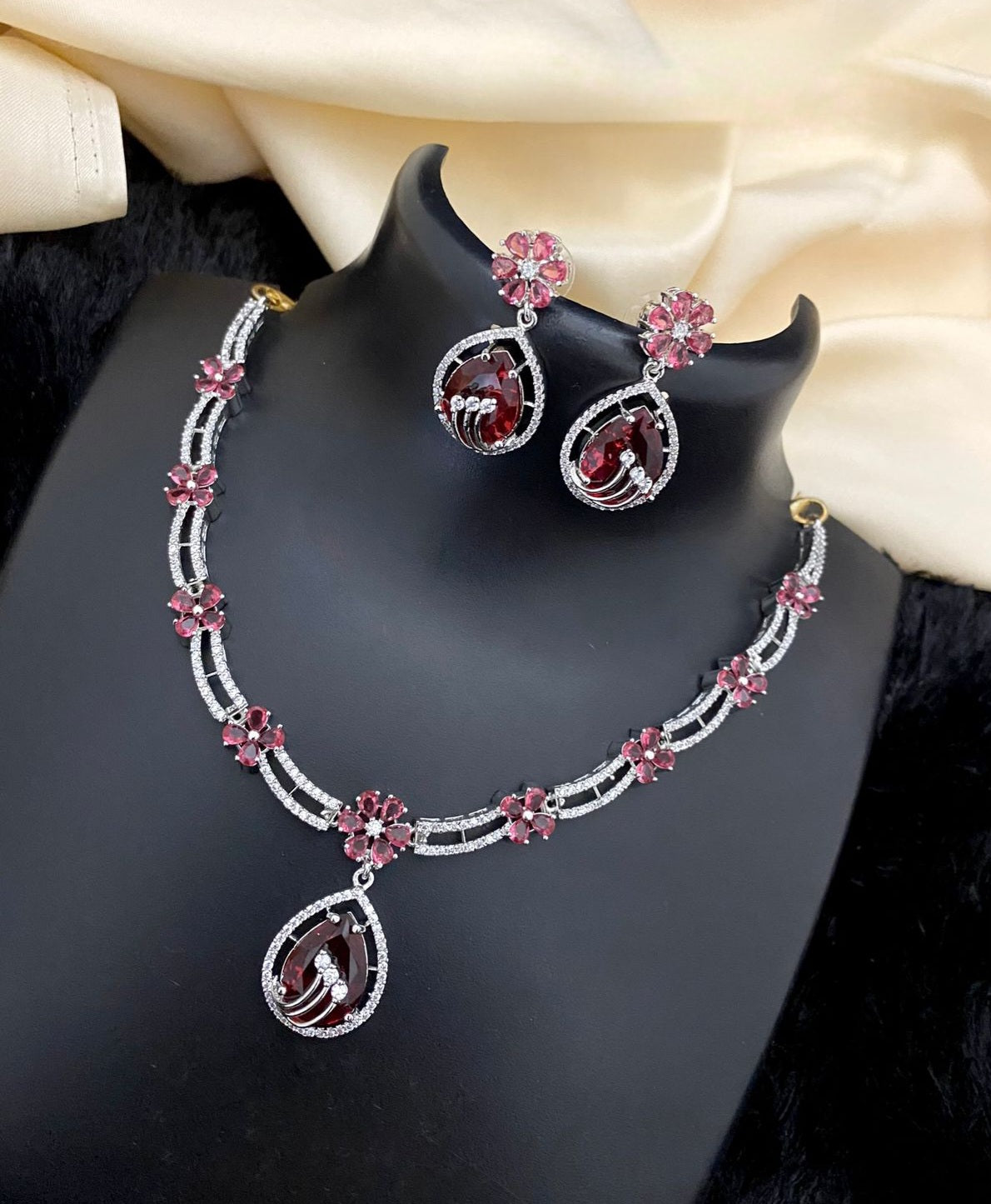 Ruby and Diamond Halo Earring and Necklace Set in White Gold | KLENOTA