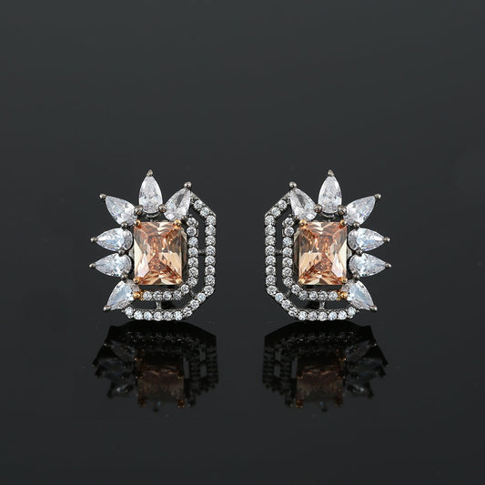 Square cut Clear stone Flower Stud Earrings accented with Rhodium plated Background