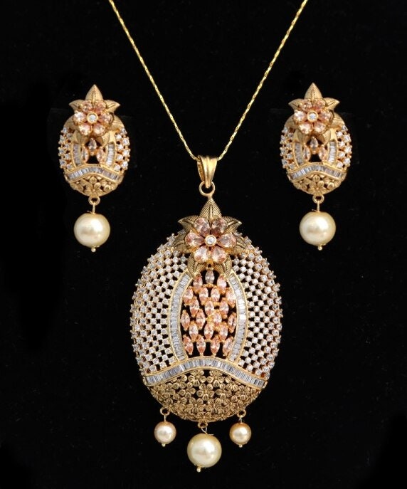 Oval Shaped American Diamond Pendant with White CZ Stone and Faux pearl for Women