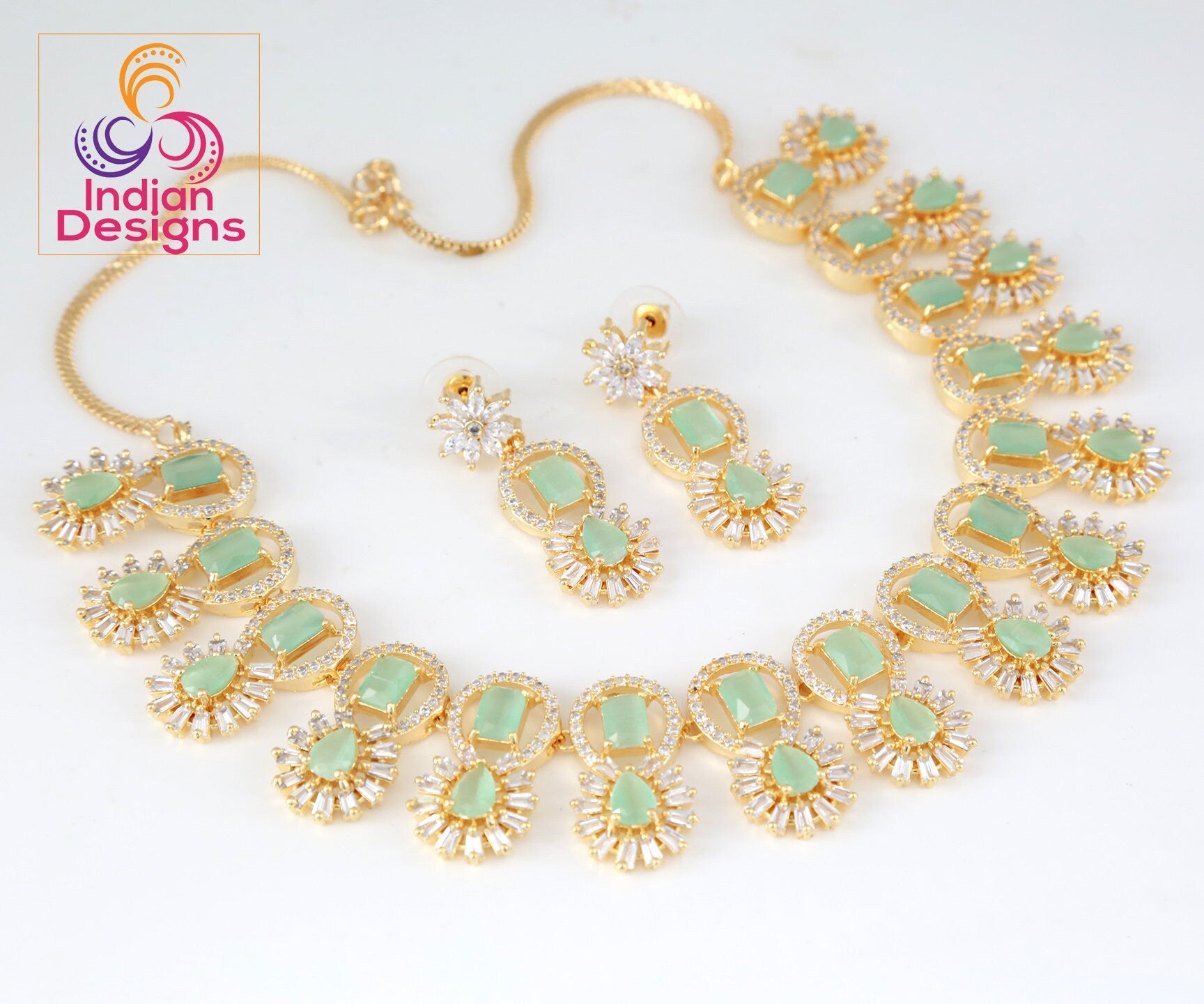 American diamond necklace set | Gold plated cubic zirconia necklace | Emerald green stone gold necklace designs | Indian Wedding Jewelry