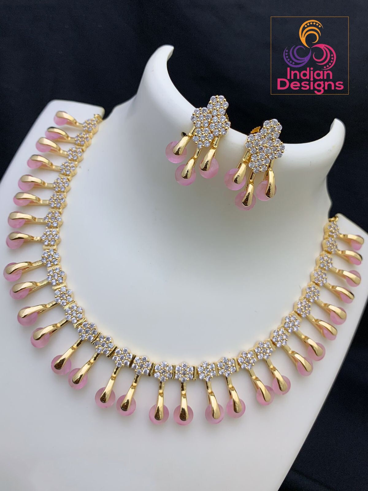 Unique and Exclusive CZ American Diamond necklace Earring set | Gold-plated American diamond necklace set with earrings |