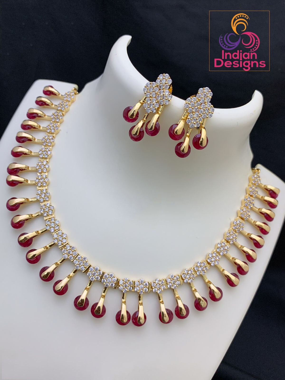 Unique and Exclusive CZ American Diamond necklace Earring set | Gold-plated American diamond necklace set with earrings |