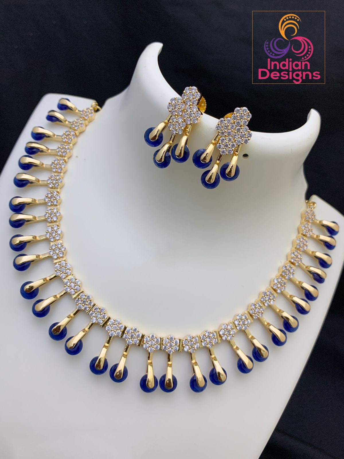 Unique and Exclusive CZ American Diamond necklace Earring set | Gold-plated American diamond necklace set with earrings |