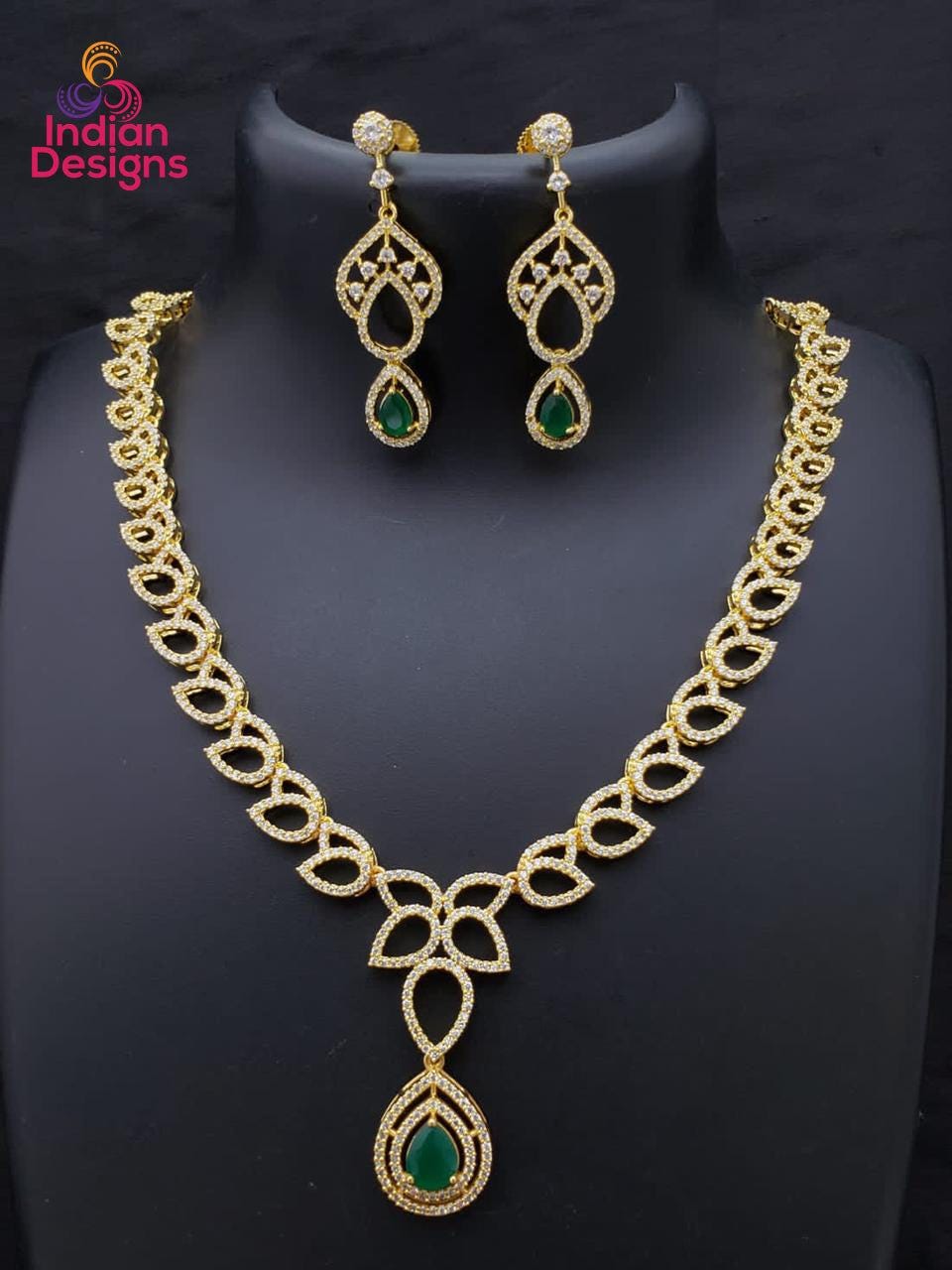 Beautiful CZ American Diamond necklace in gold polish with Tear-drop Color stone Pendant