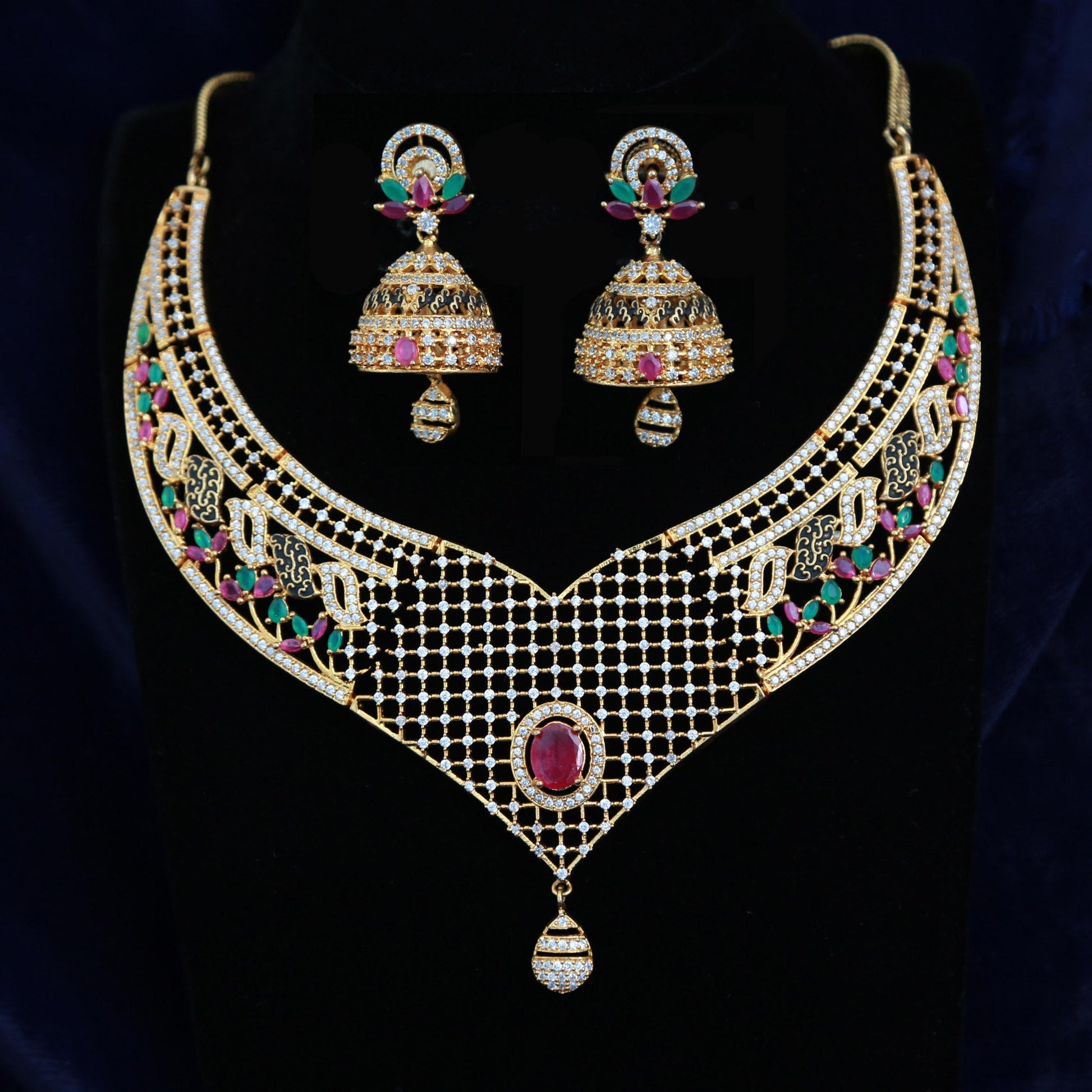 Gold-Plated Designer Net Necklace Set with Ruby, Emerald, and White CZ Stones – Bridal Jewelry with Jhumkas for Weddings & Special Occasions