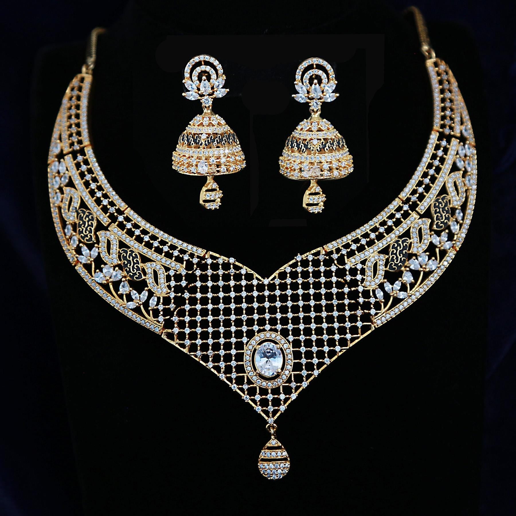 Gold-Plated Designer Net Necklace Set with Ruby, Emerald, and White CZ Stones – Bridal Jewelry with Jhumkas for Weddings & Special Occasions