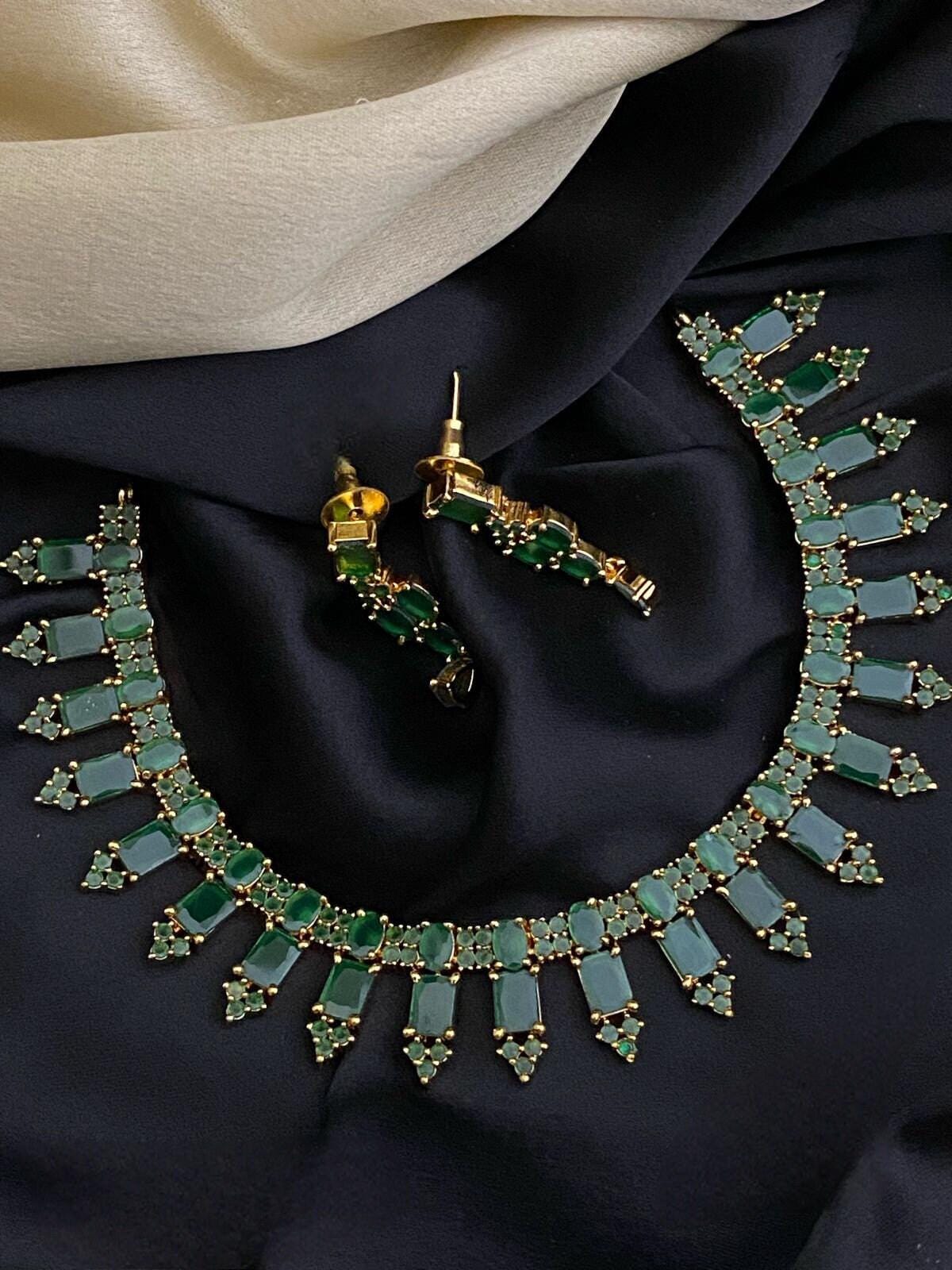 Gold plated Cz American Diamond ruby, Emerald and Blue Sapphire stones necklace earrings Indian Jewelry | AD stones Simple gold choker set
