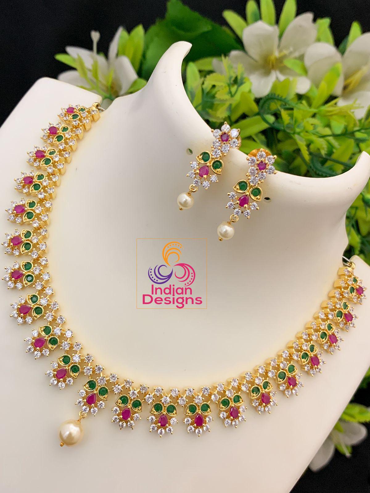 South Indian CZ Necklace jewelry design | American diamond choker necklace set | Gold tone emerald necklace | Ruby stone flower necklace