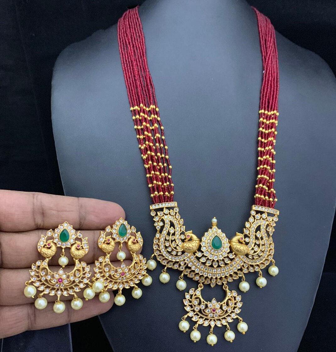 Traditional matte finish emerald cz necklace| south indian temple jewelry for weddings| american diamond multi-strand bead necklace| gift