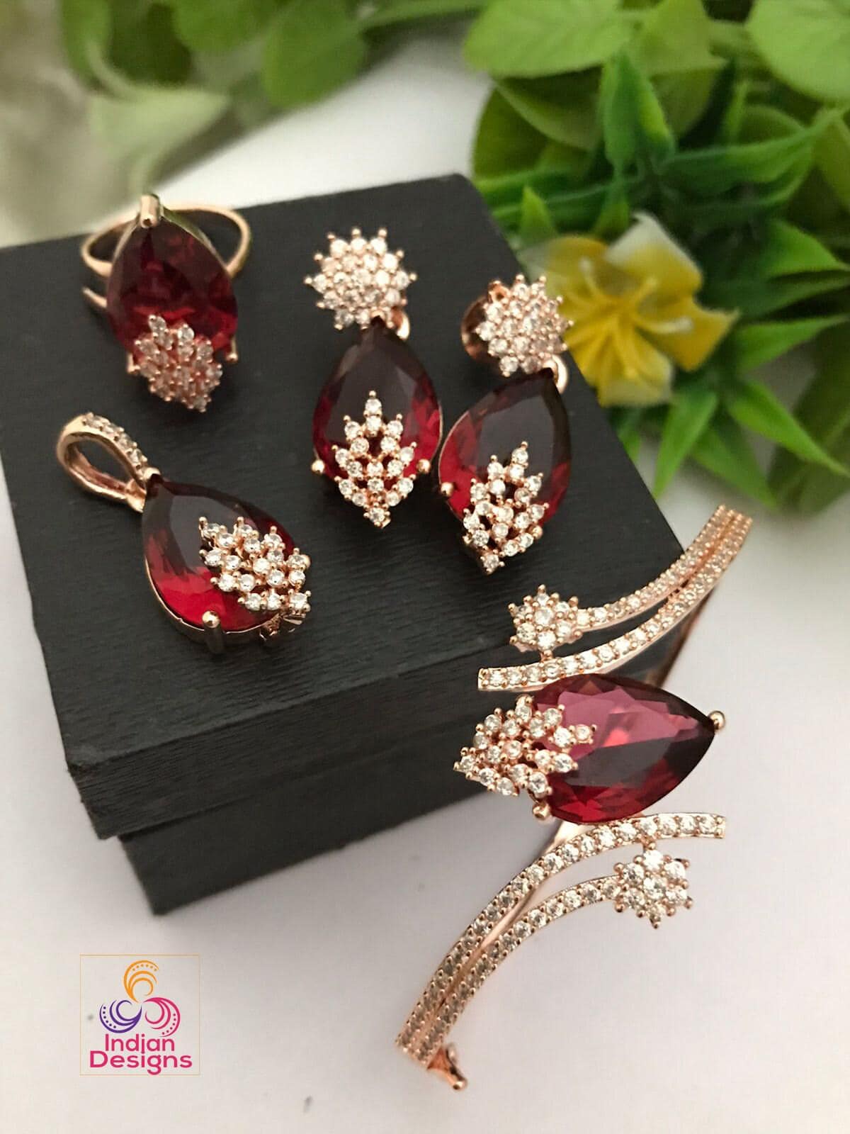 Pink stone jewelry combo set with pendant bracelet earrings and ring