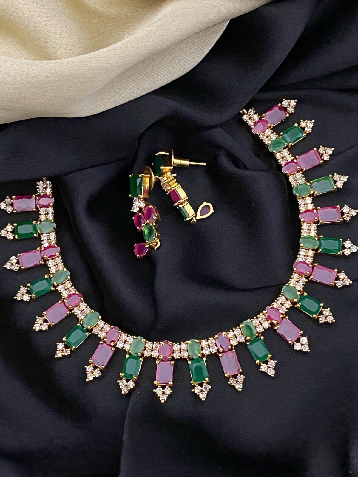 Gold plated Cz American Diamond ruby, Emerald and Blue Sapphire stones necklace earrings Indian Jewelry | AD stones Simple gold choker set