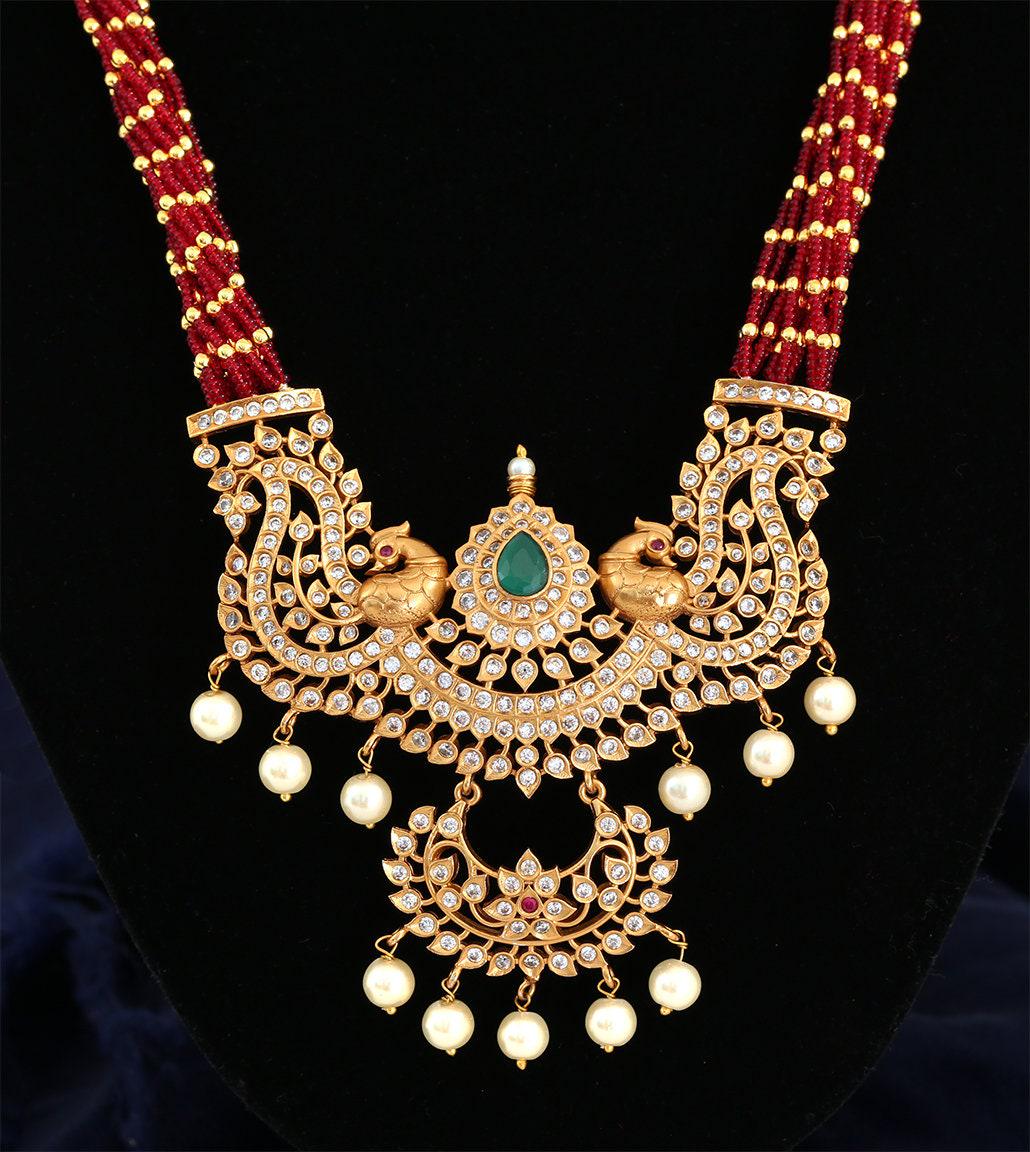 Traditional matte finish emerald cz necklace| south indian temple jewelry for weddings| american diamond multi-strand bead necklace| gift