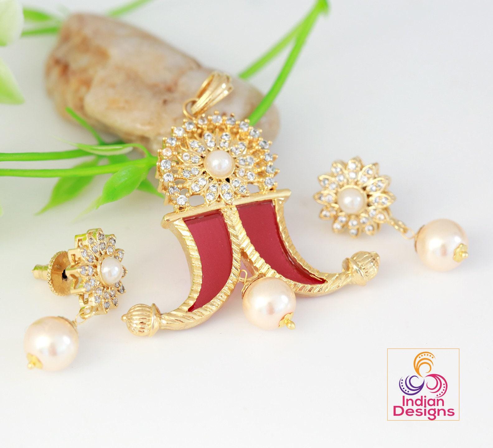 Gold plated puligoru pendant | american diamond tiger claw pendant designs | ad locket | cz pearl pendant | south indian jewelry designs
