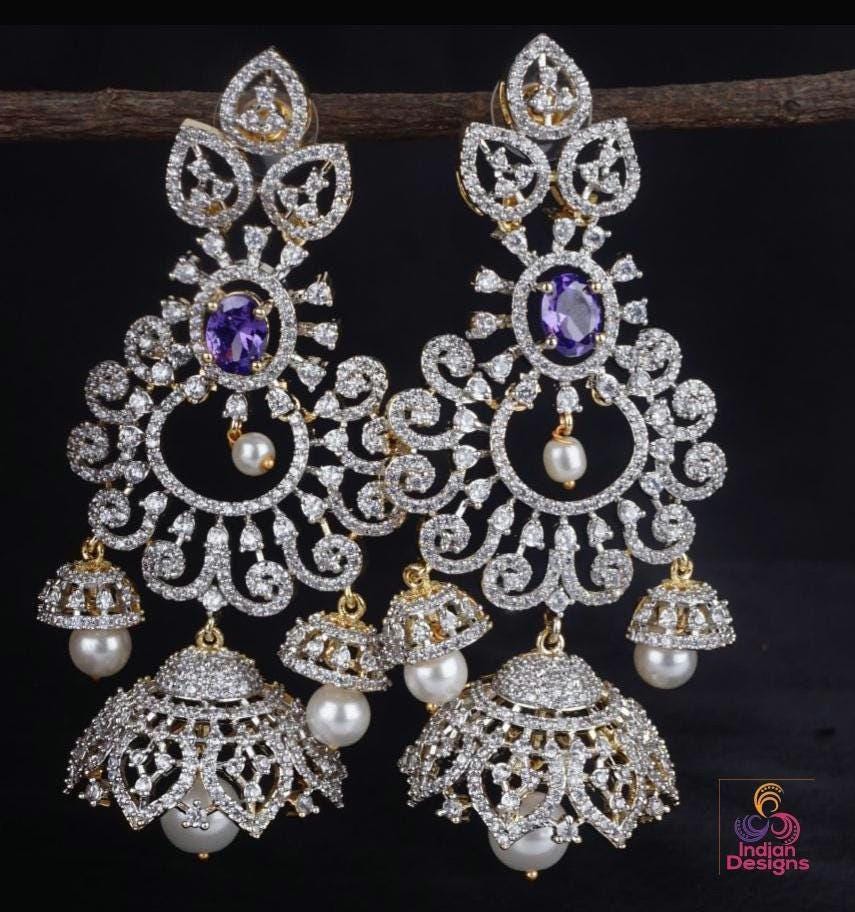 American diamond jhumka earrings| cz american diamond long jhumka drop earrings| ruby green purple stone jhumkis| indian party wear earrings