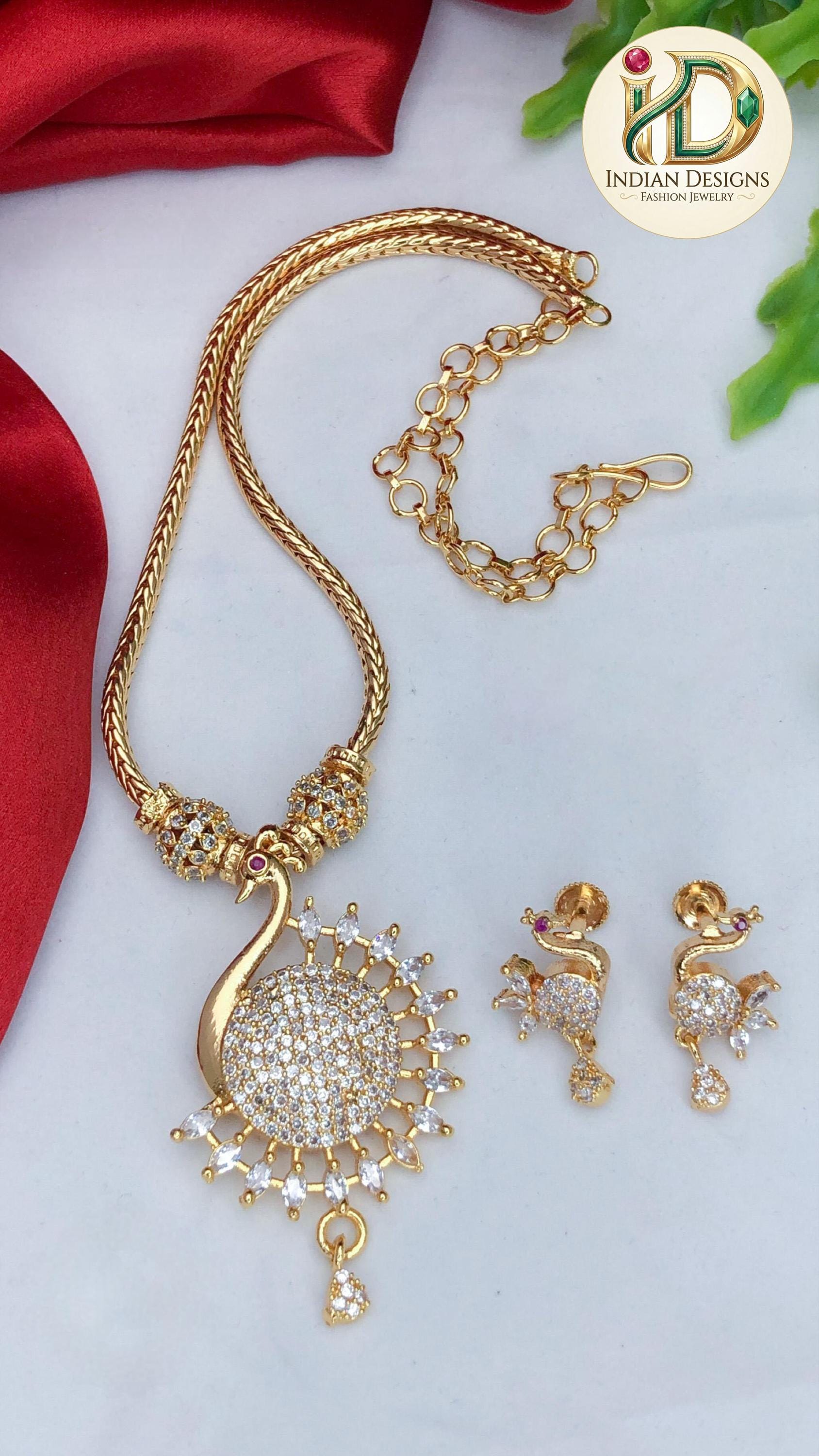 Gold plated peacock necklace set| south indian ad stone jewelry| traditional ruby emerald white pendant| simple bollywood wedding gift