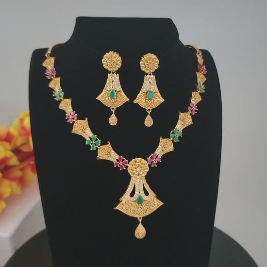 Gold plated ad stone floral necklace and earrings| indian jewelry| american diamond matte gold necklace| temple style cz ruby green jewelry