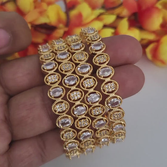 Gold plated american diamond white oval stone bangles set of 4|one gram gold cz party wear bangles| 22k yellow gold bangle set| gift for her