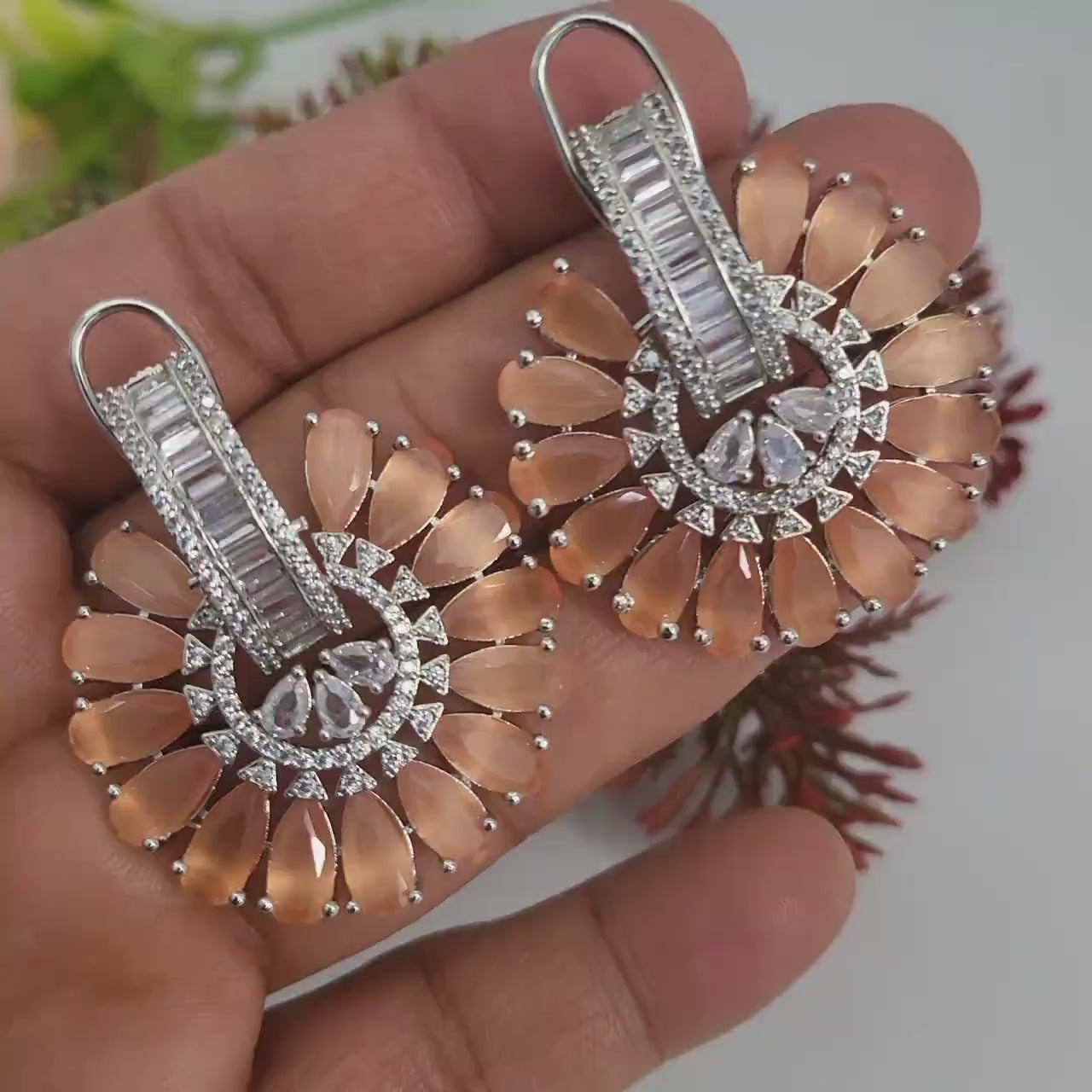 Big flower stud crystal earrings | ad stud earrings peach stones | rhodium plated american diamond stud earrings | bollywood style cz studs
