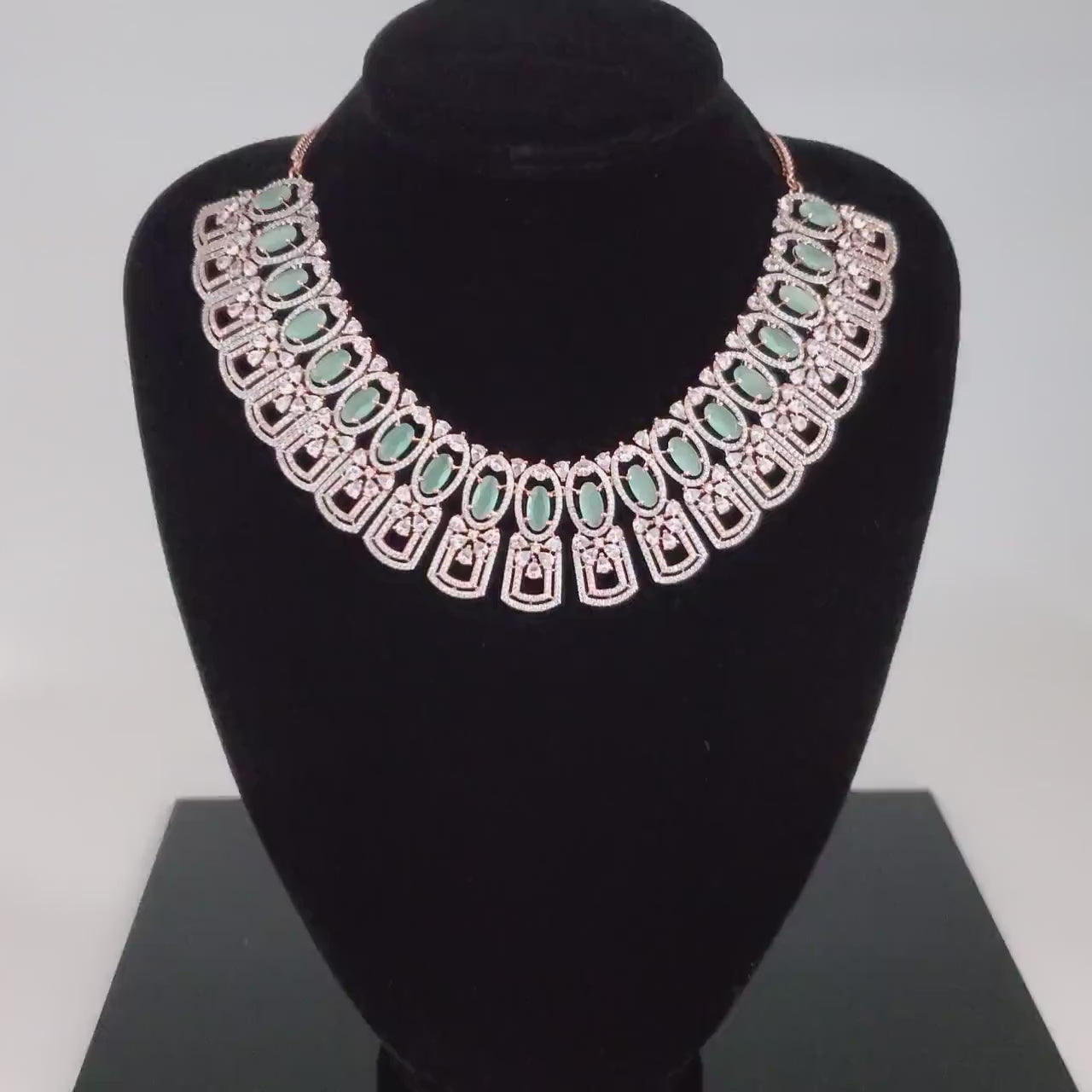 Rose gold american diamond necklace jewelry | earring mang tikka set | in pink-mint green oval stones studded with real teardrop crystals