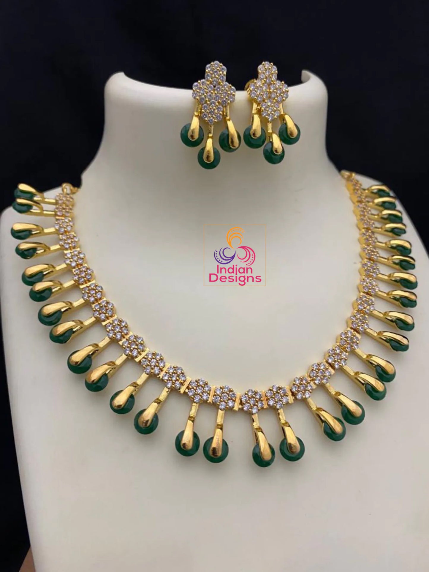 Unique and Exclusive CZ American Diamond necklace Earring set | Gold-plated American diamond necklace set with earrings |