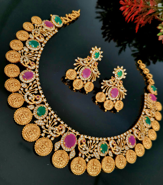 Matte Gold Lakshmi Coin & Peacock design Choker Necklace with Intermittent Oval Ruby-Emerald Stones