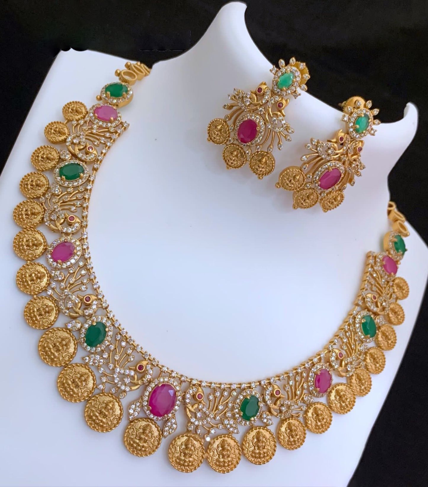 Matte Gold Lakshmi Coin & Peacock design Choker Necklace with Intermittent Oval Ruby-Emerald Stones