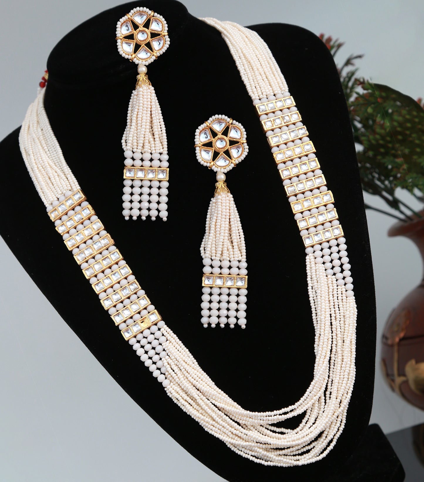 Gold Plated Multi-strand long Pearl and hydro beads set with Kundan stones and Floral Earrings