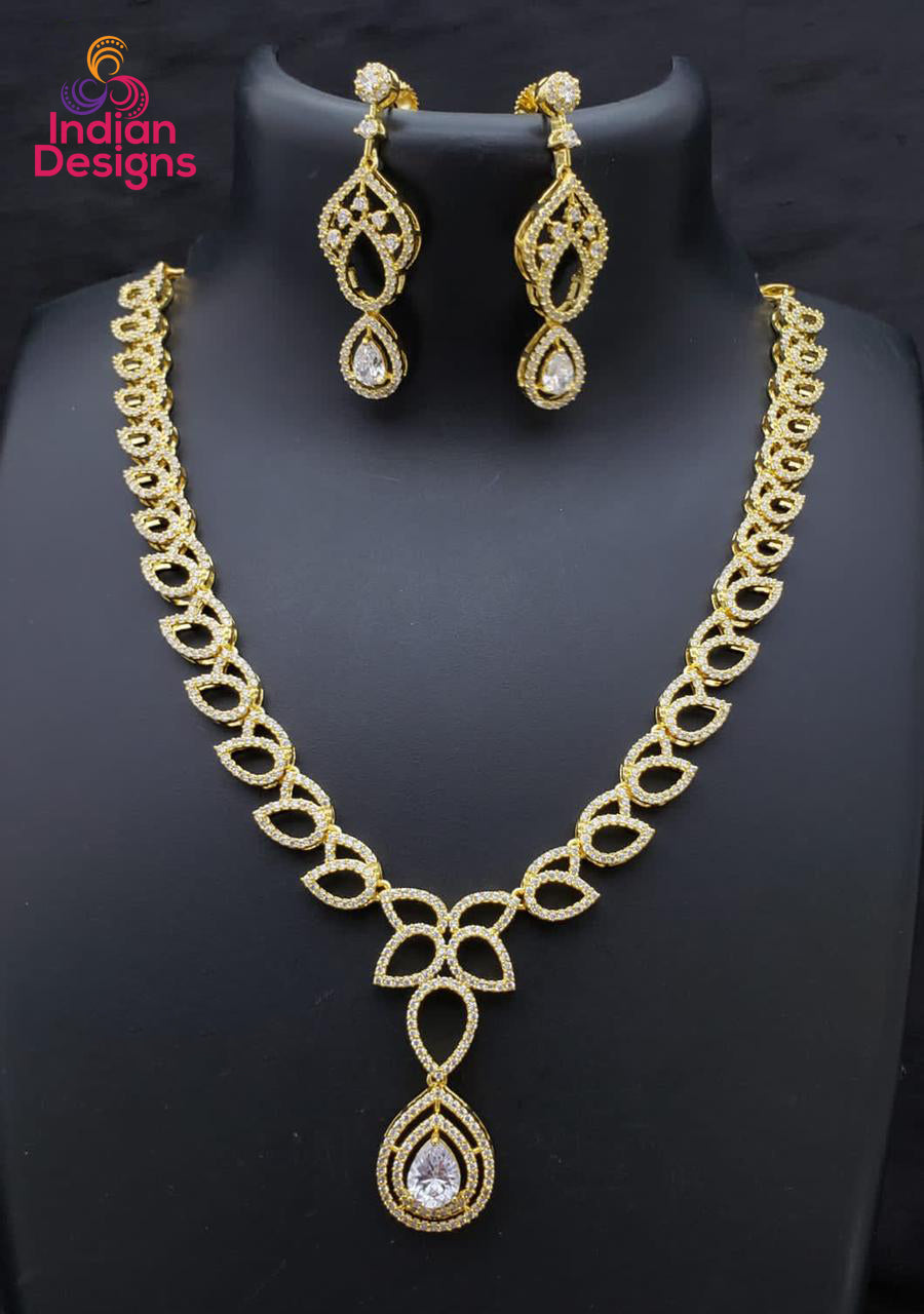 Beautiful CZ American Diamond necklace in gold polish with Tear-drop Color stone Pendant