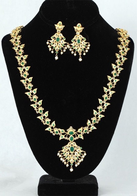 Grand American Diamond Long Necklace studded with emerald stones fashion party wear jewelry
