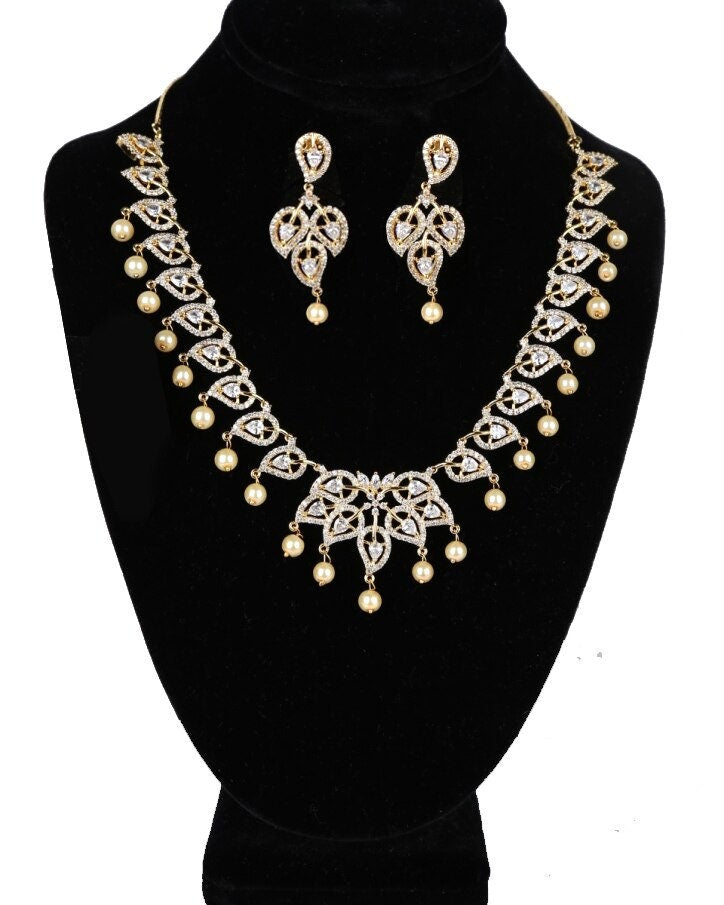 American Diamond Mango Design bridal necklace set with Topaz,Ruby,blue,clear stones and faux pearls