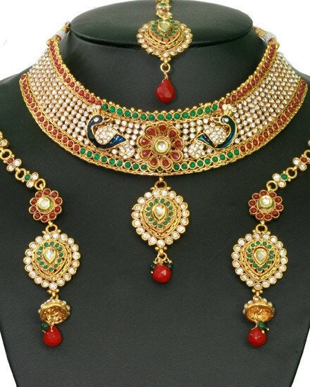 Costume Indian fashion semi bridal necklace set with emerald, ruby and clear stones