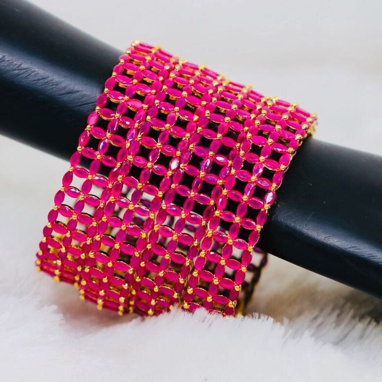 Indian style 22K gold zircon bangles studded with Clear ruby pink topaz cubic zirconia