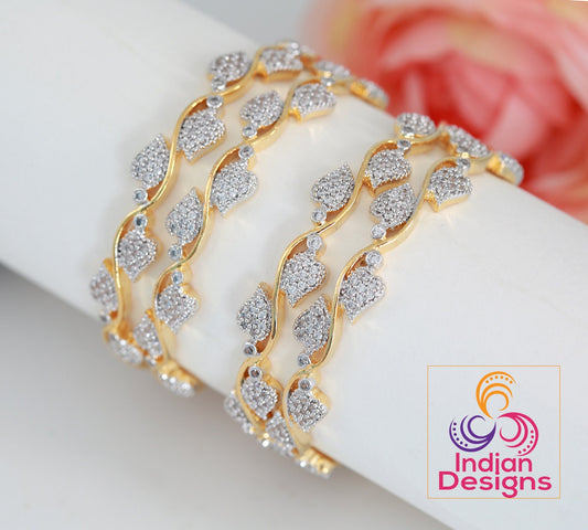 Leaf design American Diamond bangles set of 4 | CZ bracelet Crystal Bangles | Gold plated American Diamond studded Bangle at Best Price