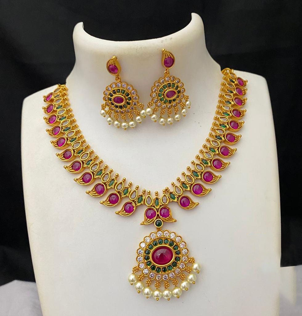High Quality Designer gold plated kemp necklace with American Diamond Ruby And Emerald stones | Indian Wedding jewelry | Temple jewelry set
