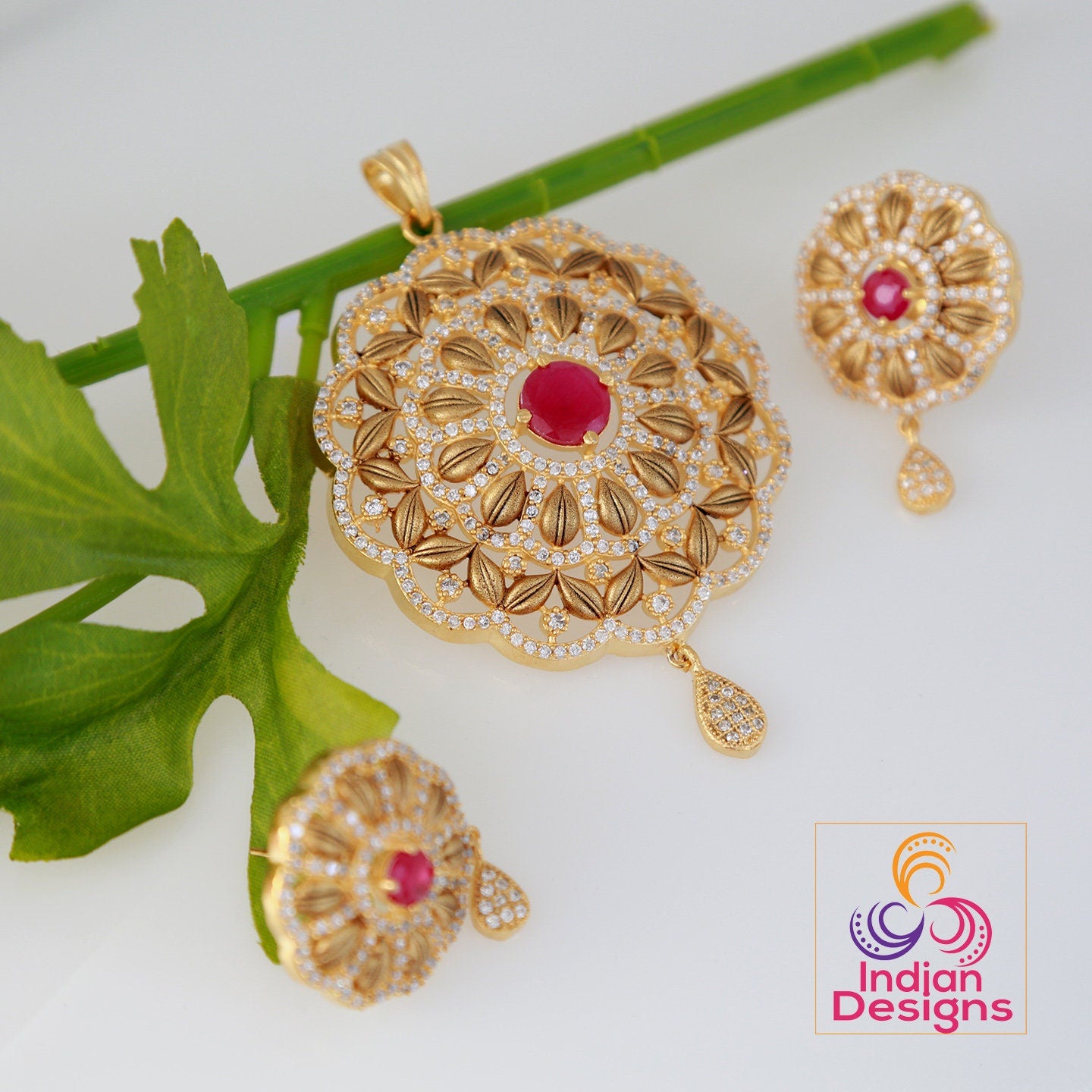 Floral art pendant | American Diamond Pendant Set with Ruby Emerald and White Stones | Matte Finish Gold plated pendant set | Indian jewelry