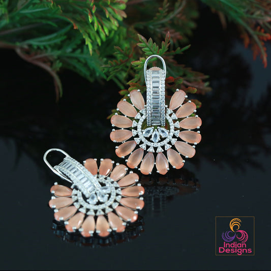 Big flower stud Crystal earrings | Ad stud earrings Peach stones | Rhodium Plated American Diamond stud Earrings | Bollywood style CZ Studs