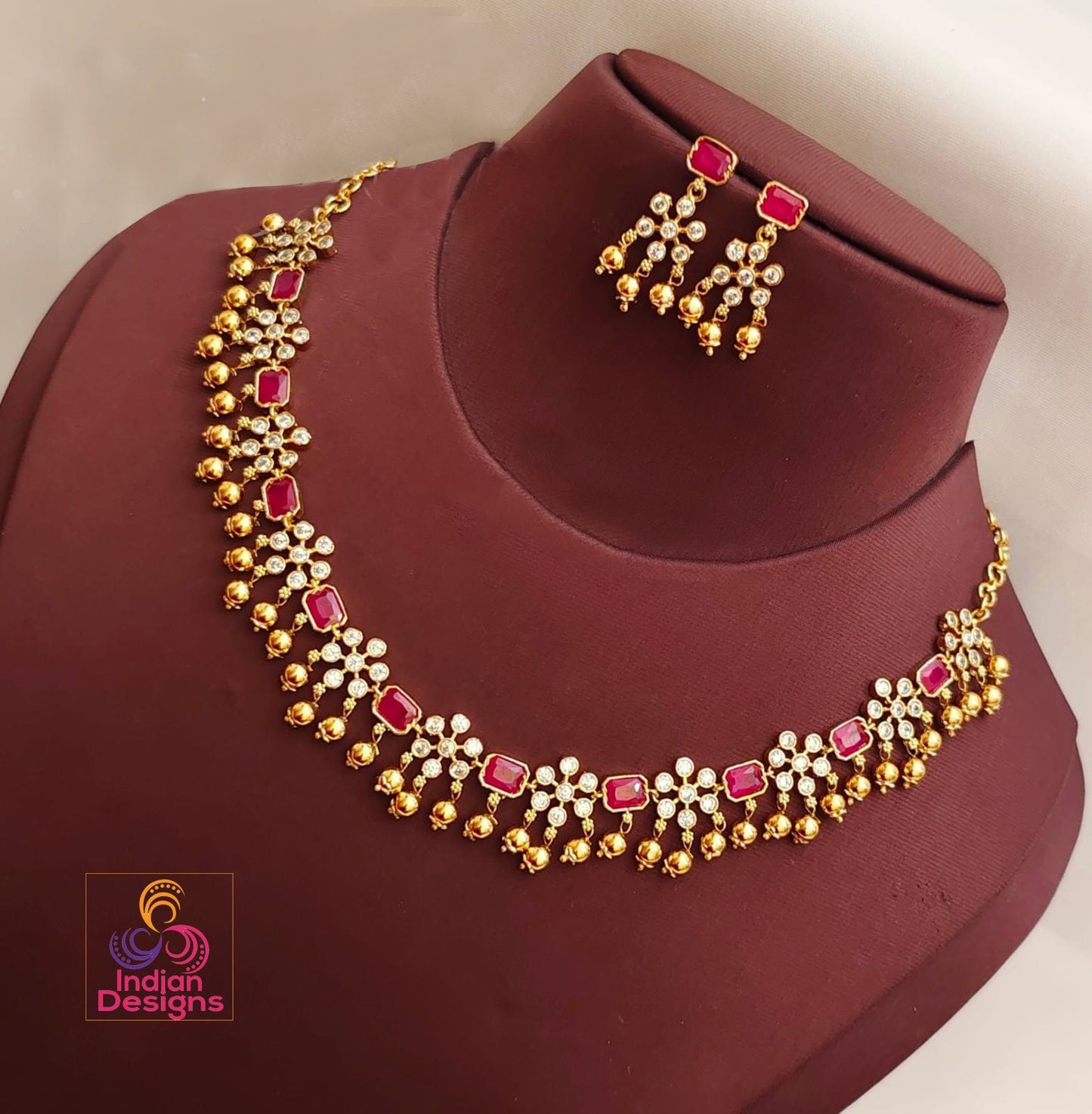 Gold plated necklace earring set | Simple gold choker | Gold plated Navratna stone necklace | Designer gold tone necklace South Indian style